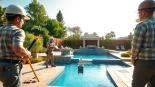 Skilled swimming pool builder constructing a luxury backyard pool in a stunning garden setting.