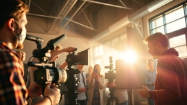 Experience 홍보영상제작 with a vibrant film crew collaborating creatively on set.