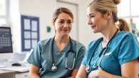 Nurse assisting a patient, representing the Alabama Board of Nursing's commitment to healthcare.
