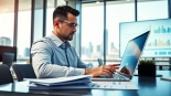 Corporate FP&A Consultant analyzing financial strategies in a bright office setting.