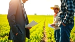 Lawyer advising on agriculture law with farmers in a vibrant field.