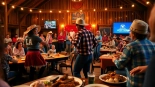 Enjoying a lively performance at firelight barn dinner theater featuring dancing and BBQ delights.
