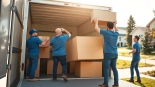 Movers Calgary loading furniture into a truck, showcasing a professional and efficient moving process.